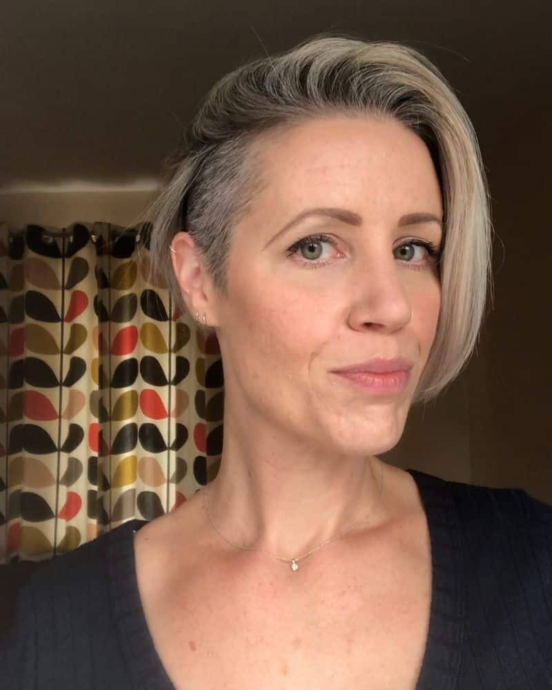 46. Asymmetrical Undercut with Long Side-Swept Bangs
