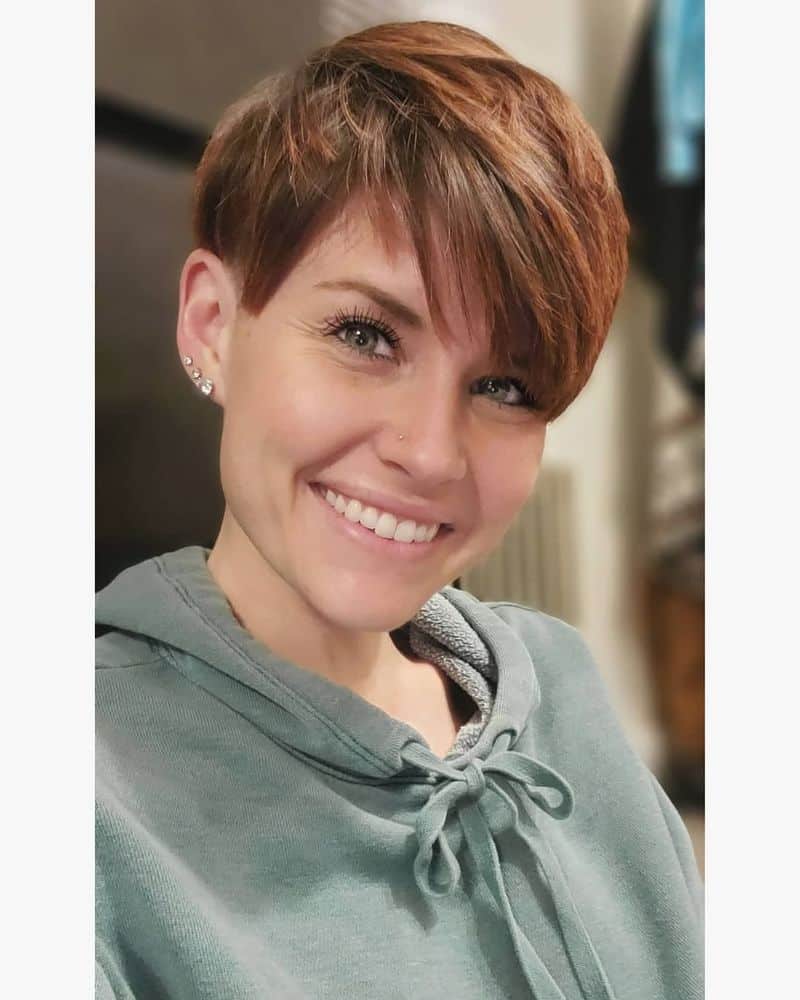 65. Auburn Side-Swept Pixie with Tapered Sides