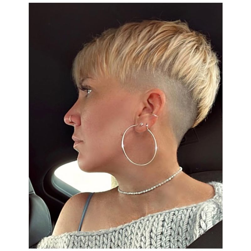 62. Bleach Blonde Undercut Pixie with Forward Fringe