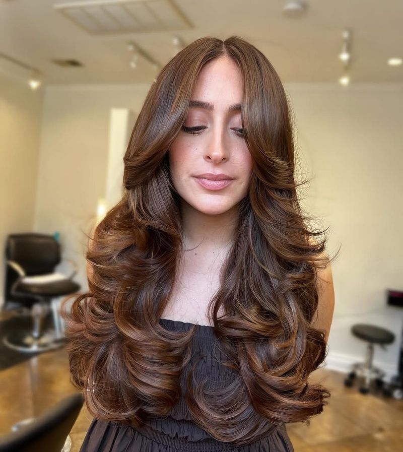 73. Blowout Layers with Curtain Bangs