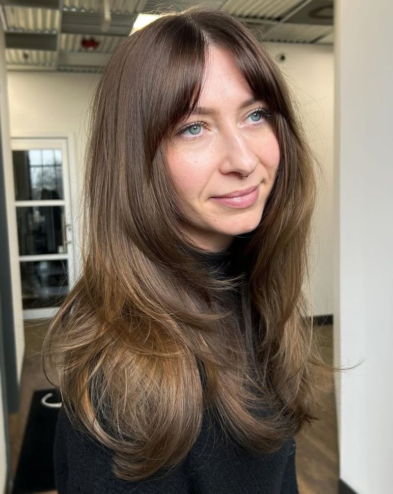 65. Chestnut Layers with Curtain Bangs