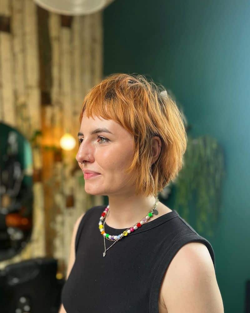 32. Copper Micro-Bangs with Shaggy Layers