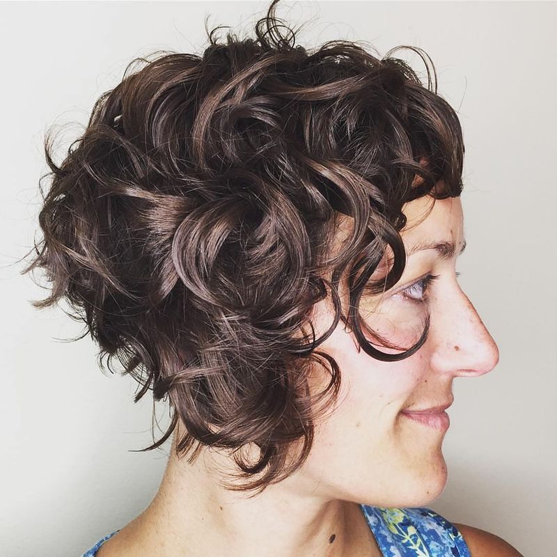 8. Curly Stacked Pixie with Short Bangs