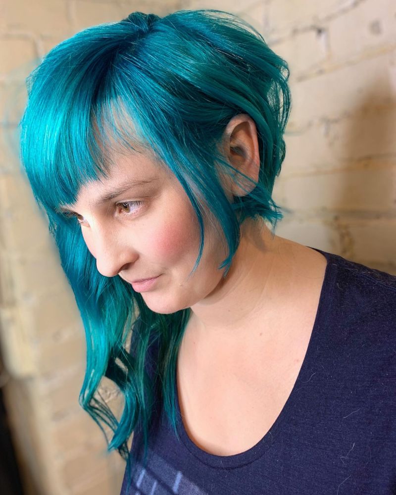 54. Electric Teal Asymmetric Pixie with Long Side Tendril