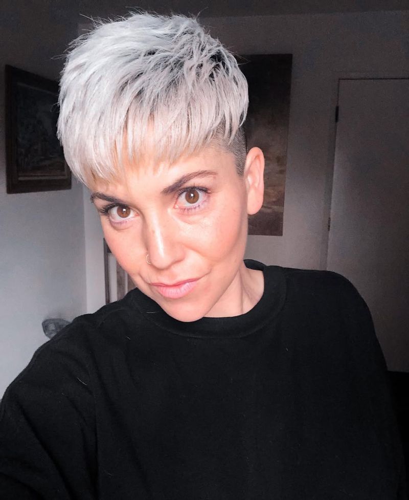 48. Icy Platinum Undercut with Piecey Fringe