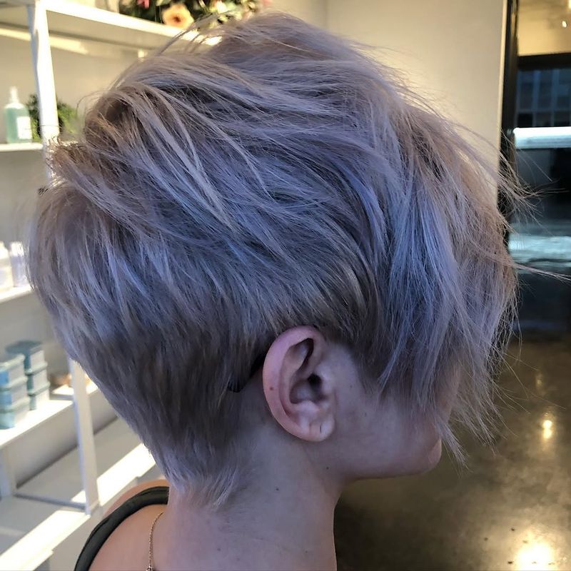 18. Lavender Undercut with Side-Swept Fringe