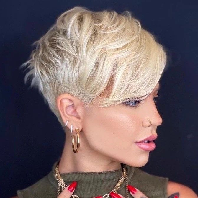 18. Platinum Undercut with Sweeping Side Bangs
