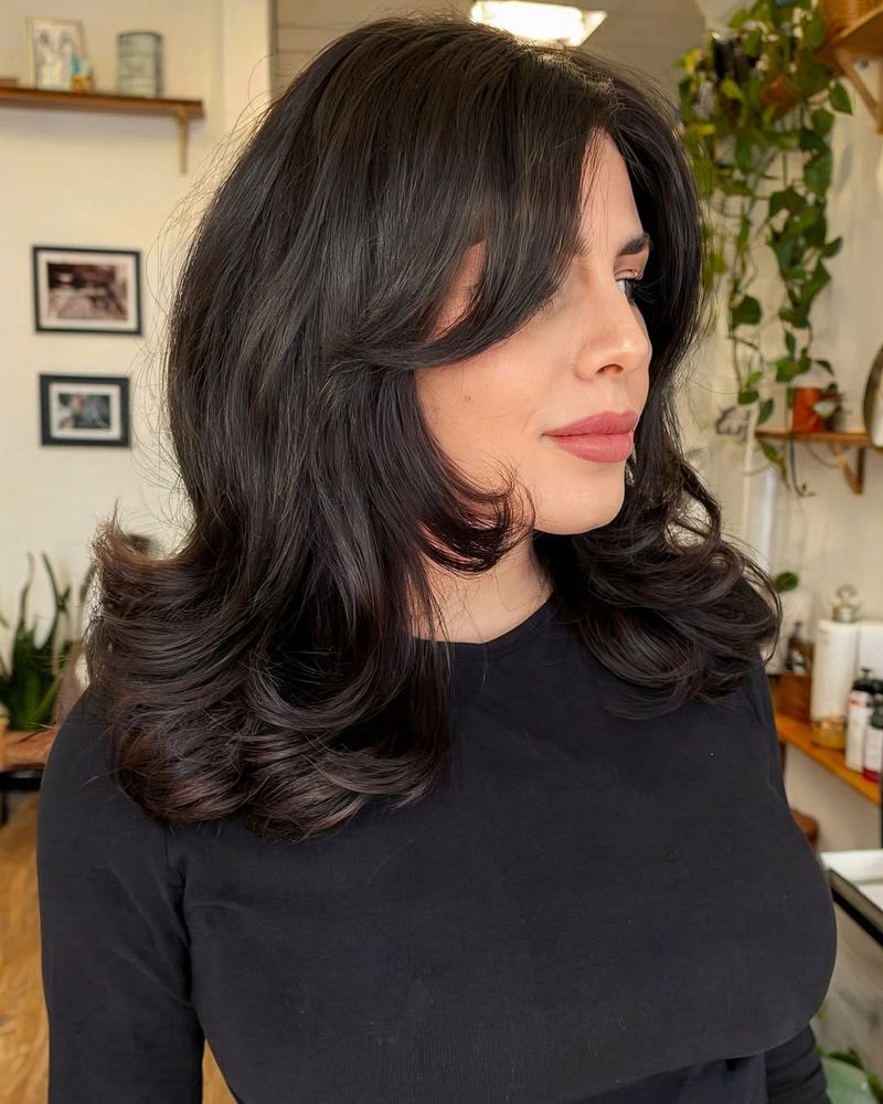 39. Retro Volume Blowout with Curtain Bangs