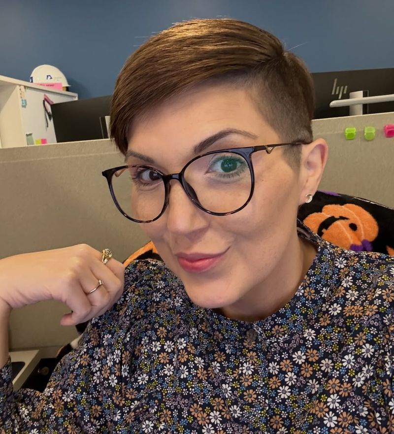 54. Side-Swept Brown Pixie with Clean Undercut