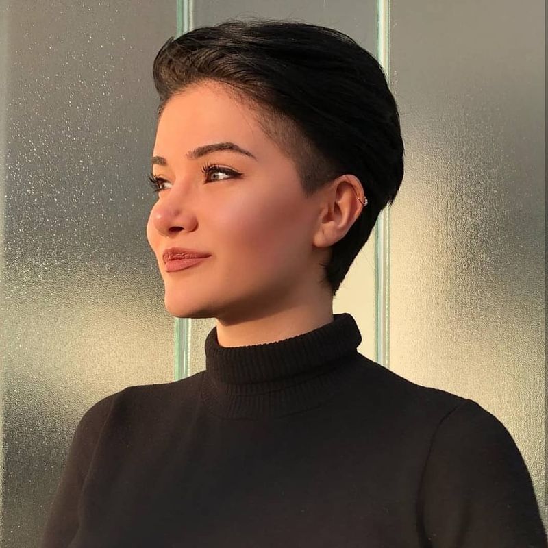 56. Sleek Dark Undercut with Brushed-Back Top