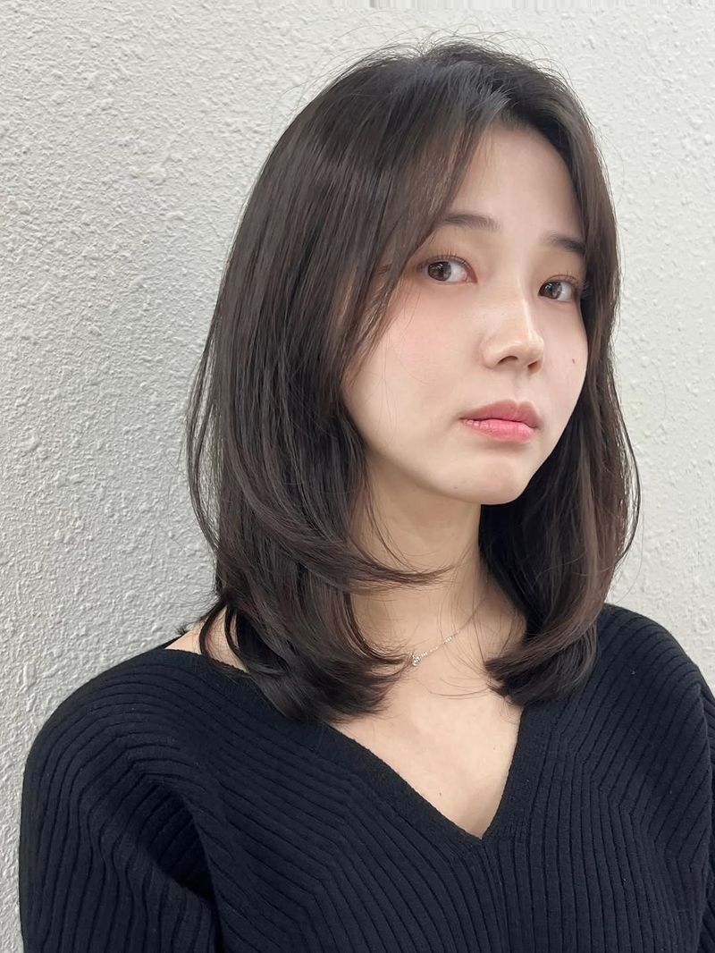 58. Soft C-Curl Lob with Curtain Fringe