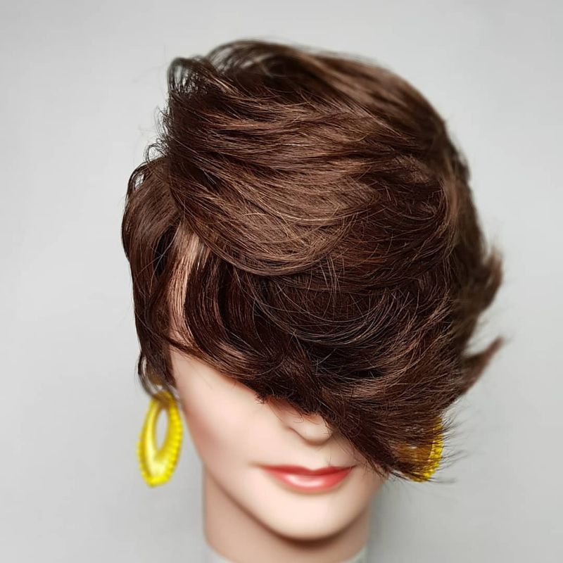 4. Sweeping Side-Parted Pixie