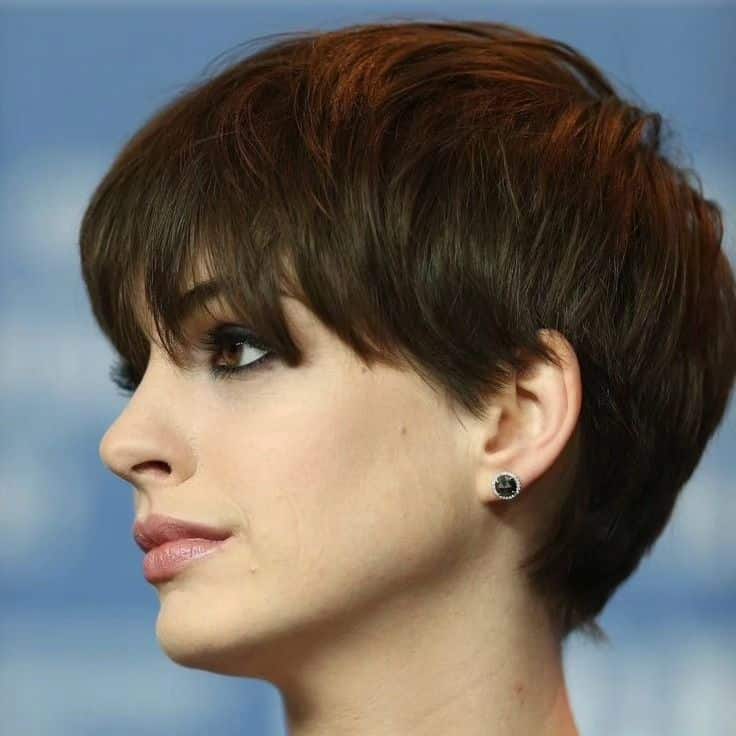 38. Textured Brunette Pixie with Soft Side-Swept Bangs