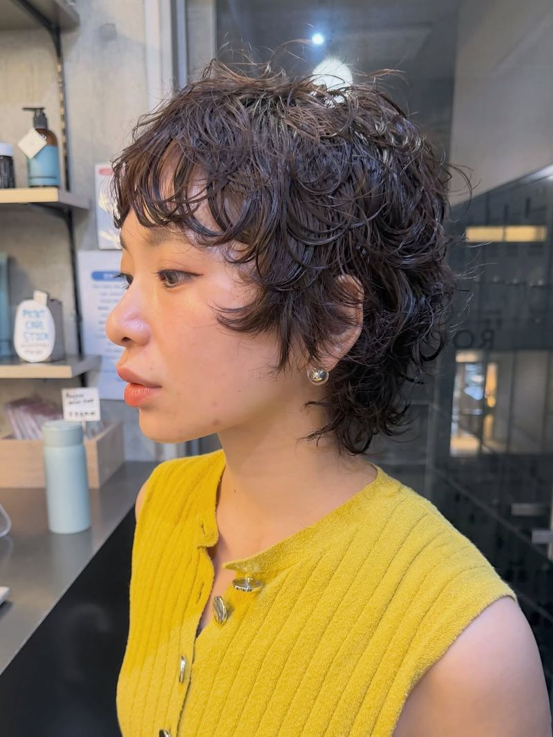 13. Tousled Wet-Look Shaggy Pixie