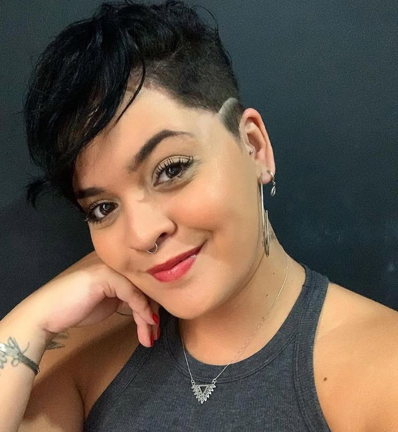 3. Undercut Pixie with Hard Part and Swept Bangs